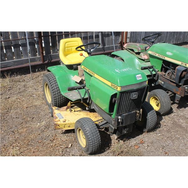 JD 300 riding mower aprox 48"extra parts running #077481m