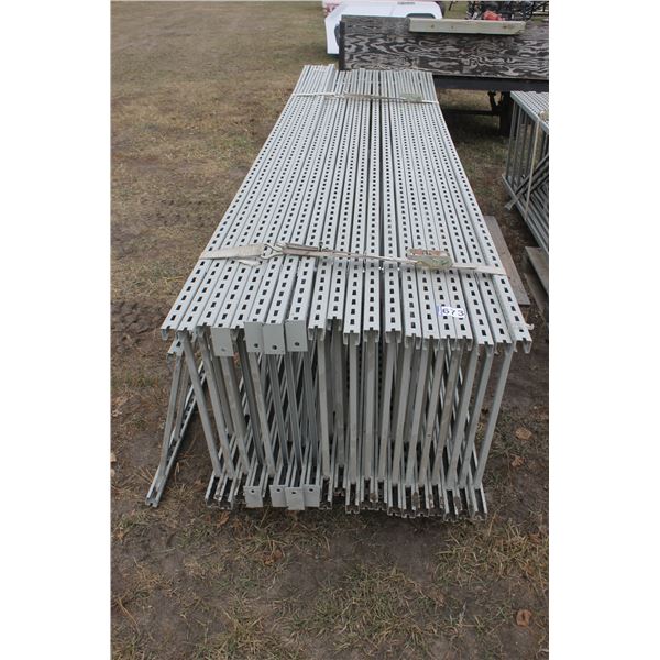 21- Uprights 2' x 12' c/w approx. 42 shelves and 124 brackets