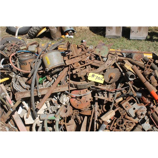 pile of scrap    east of garage ( At Adolph's Adolph Pasay 780-942-2153)