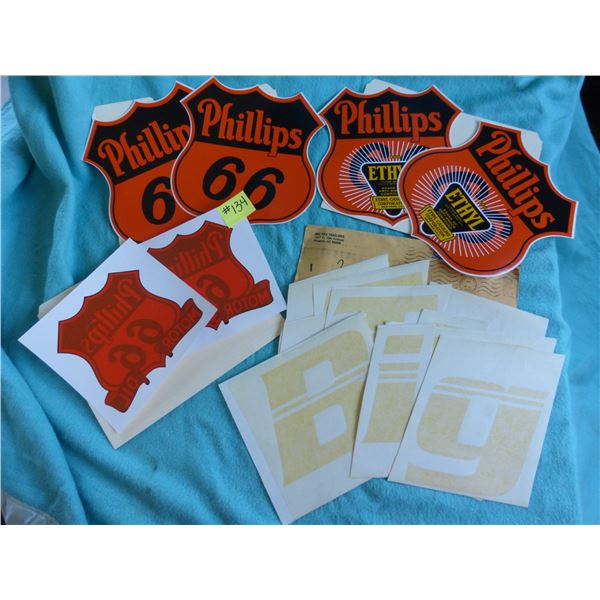 4- 9"x 9" Phillips 66 decals, 2- 7" x 8" Phillips 66 Motor oil decals and a set of 'BIG TEX' trailer