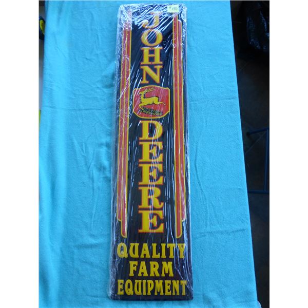 Black, yellow and red JD sign, 12" x 4'