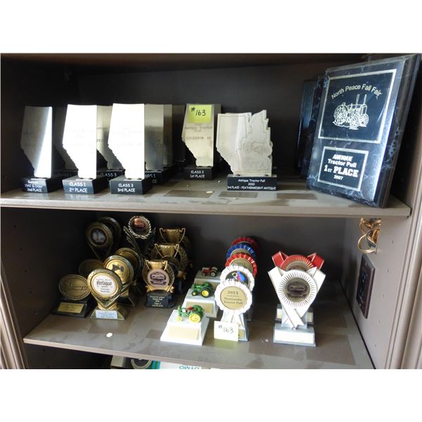 Qty of various tractor pull trophys