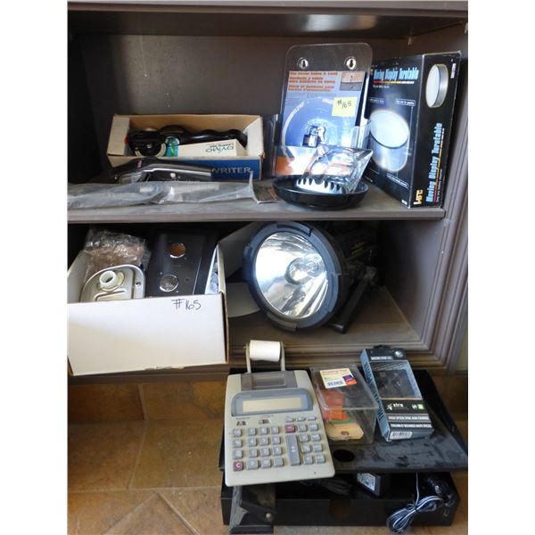 Die cast rotating table, calculator, flash light (no cord) label makers, ash trays and misc.