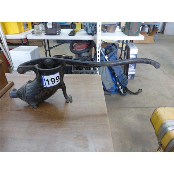 Antique cast iron sausage stuffer