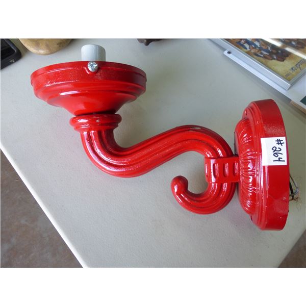 Red cast light wall sconce