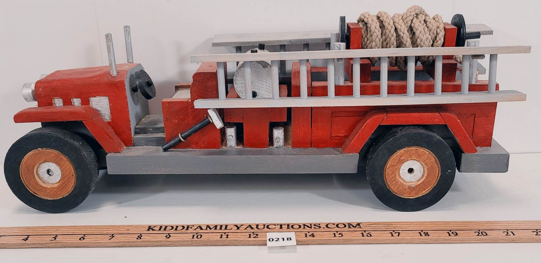 CARVED WOODEN FIRE TRUCK W/ ROPES & LADDER - Kidd Family Auctions