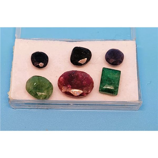 LOT OF 6 GEMSTONES, 2 EMERALDS,3 SAPPHIRES AND