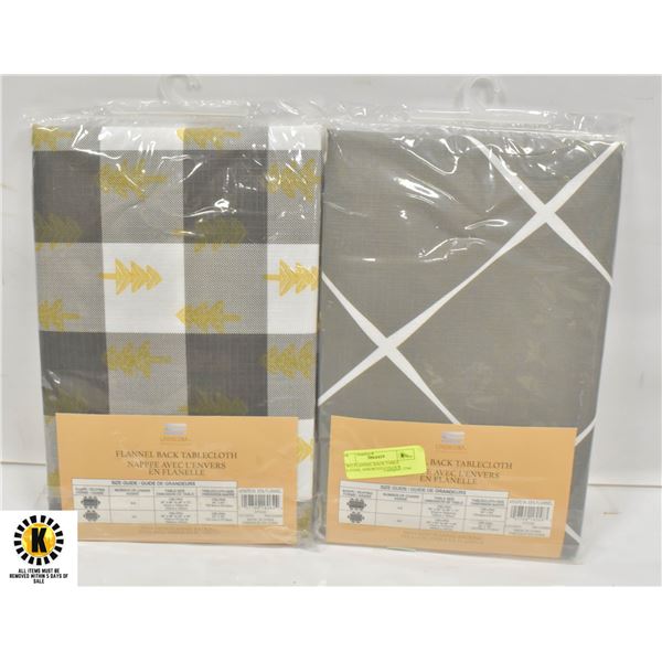 TWO FLANNEL BACK TABLE CLOTHS, ASSORTED COLOUR