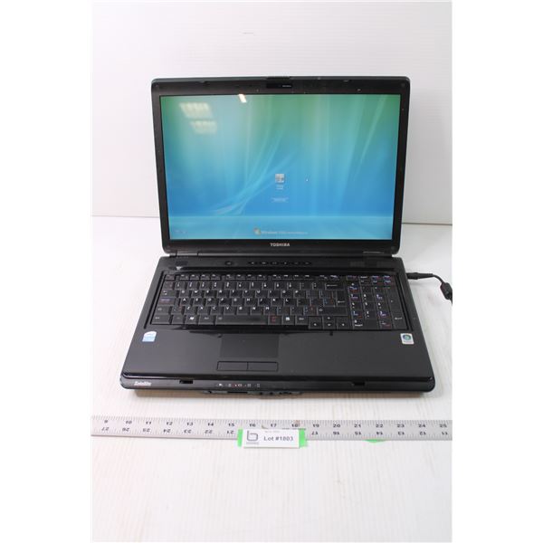 Toshiba Satellite Laptop w/ Windows Vista (Powers Up)