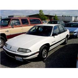 90 PONTIAC GRAND PRIX LE 4DR EXMT.                                    