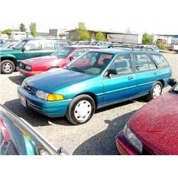 94 FORD ESCORT 5SPD 4DR S/W EXMT.                                     