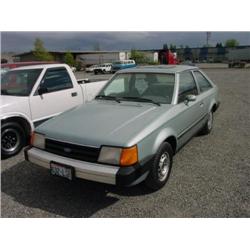86 FORD ESCORT L 2DR EXMT.                                            