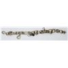 Image 1 : 7 INCH STERLING CHARM BRACELET WITH ALE