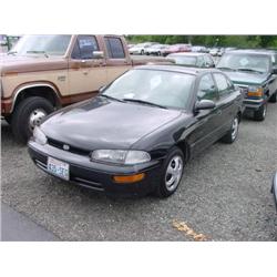 94 CHEVROLET GEO PRIZM 5SPD 4DR EXMT.                                 