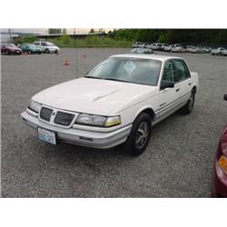 89 PONTIAC GRD AM 4DR EXMT.                                           