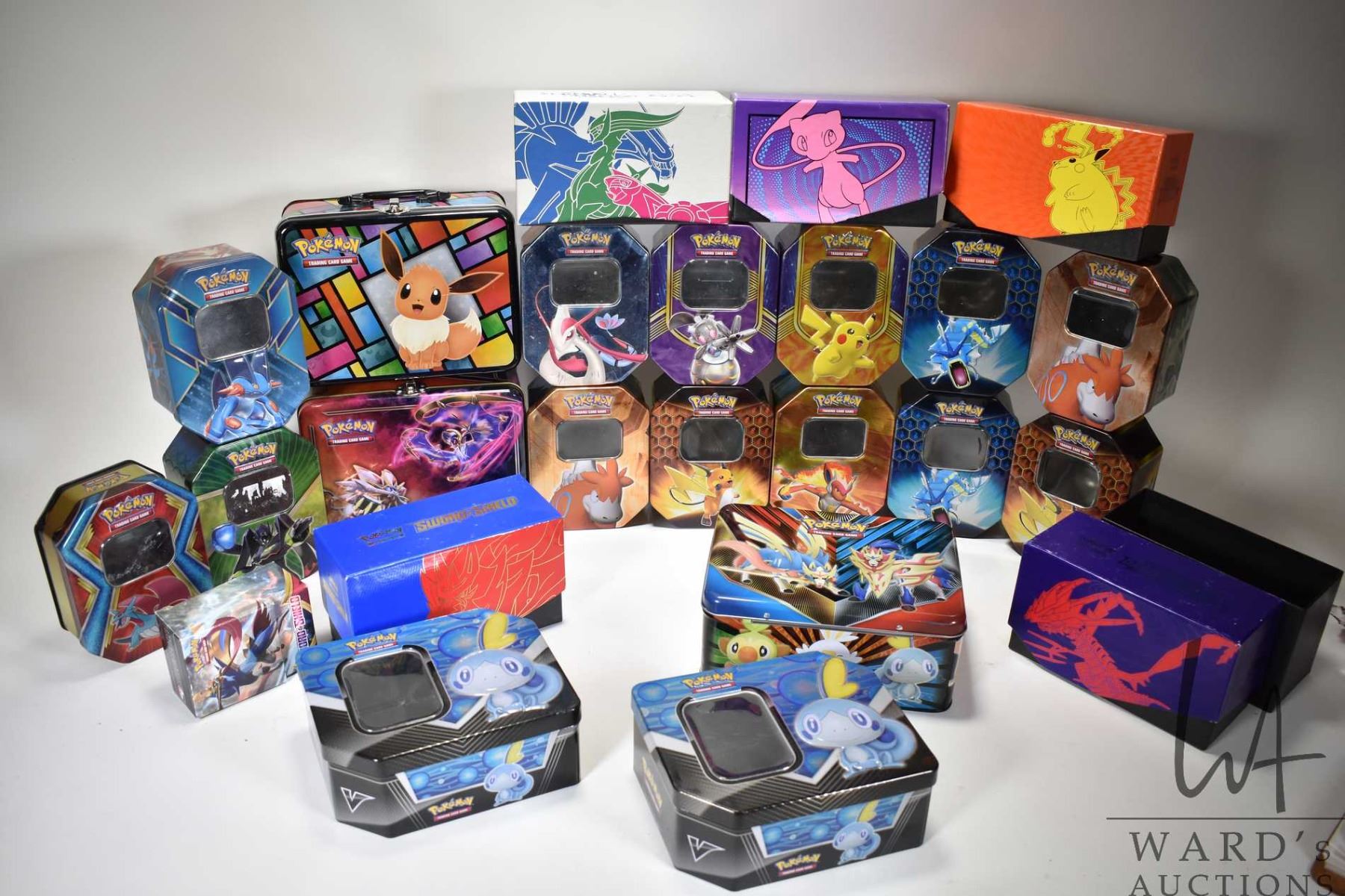Empty Pokemon Lot of empty Pokemon TCG lunch boxes, tins, and storage boxes.