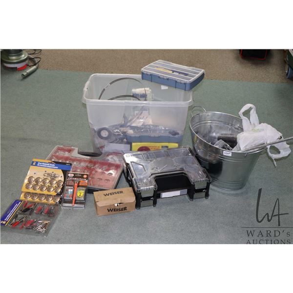 Large assortment of hardware including screws, washers, nuts, fuses, clamps, etc