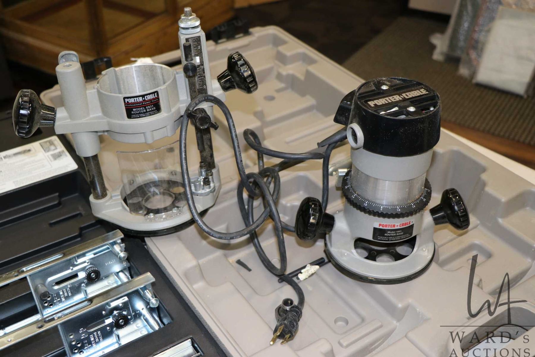 Cased Porter Cable model #1001 router with plunge base and a Porter Cased Porter Cable model #1001 router with plunge base and a Porter