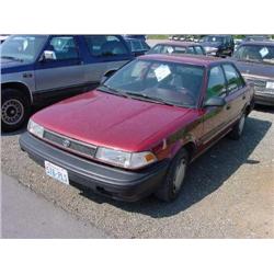 91 TOYOTA COROLLA 4DR EXMT.                                           