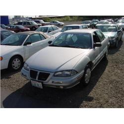 93 PONTIAC GRD AM SE 4DR EXMT.                                        