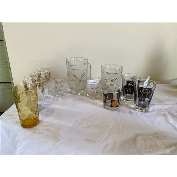 Assorted vintage glasses and pitcher and ice bucket