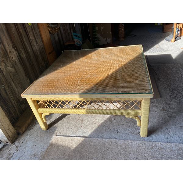 Wicker and glass coffee table