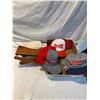 Image 1 : Budweiser caps and a stand