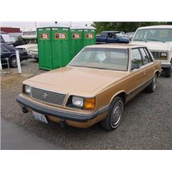 85 PLYMOUTH RELIANT 4DR EXMT.                                         