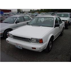 87 NISSAN STANZA 5SPD 4DR EXMT.                                       