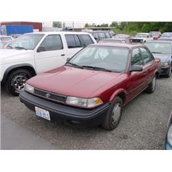 91 TOYOTA COROLLA 4DR EXMT.                                           