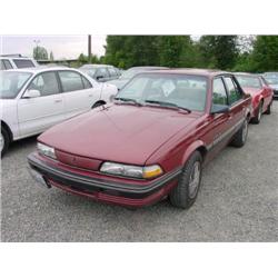 91 PONTIAC SUNBIRD 4DR EXMT.                                          