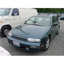 93 NISSAN ALTIMA 5SPD 4DR EXMT.                                       