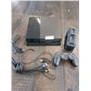Image 1 : Sony PS4 with one controller and cords (HDMI) etc along with two Nyko charging blocks