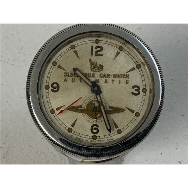 VINTAGE OLDSMOBILE MAAR SWISS AUTOMATIC CAR WATCH CLOCK