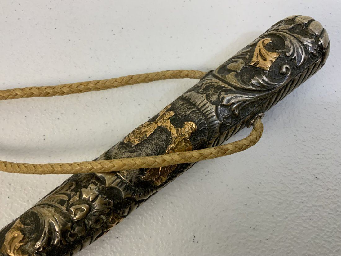 VINTAGE ARGENTINIAN SILVER AND GOLD HANDLED GAUCHO WHIP REBENQUE