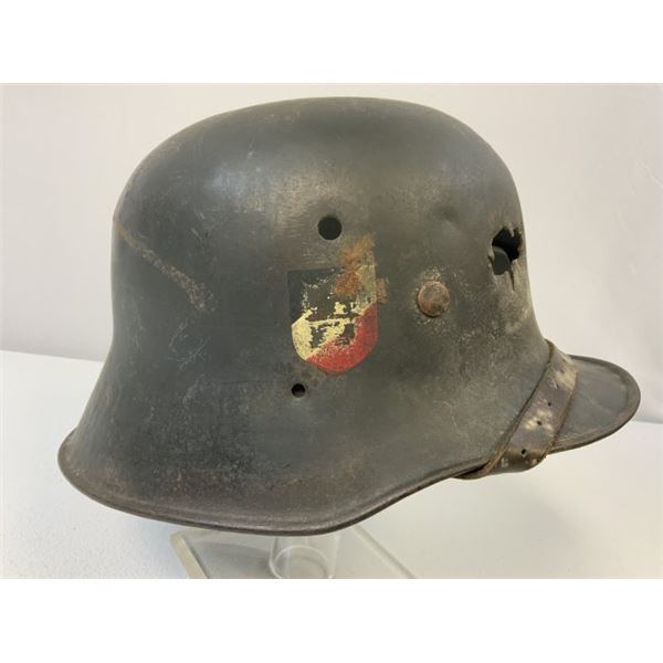 WWII GERMAN EARLY LUFTWAFFE M18 TRANSITIONAL HELMET WITH BATTLE DAMAGE