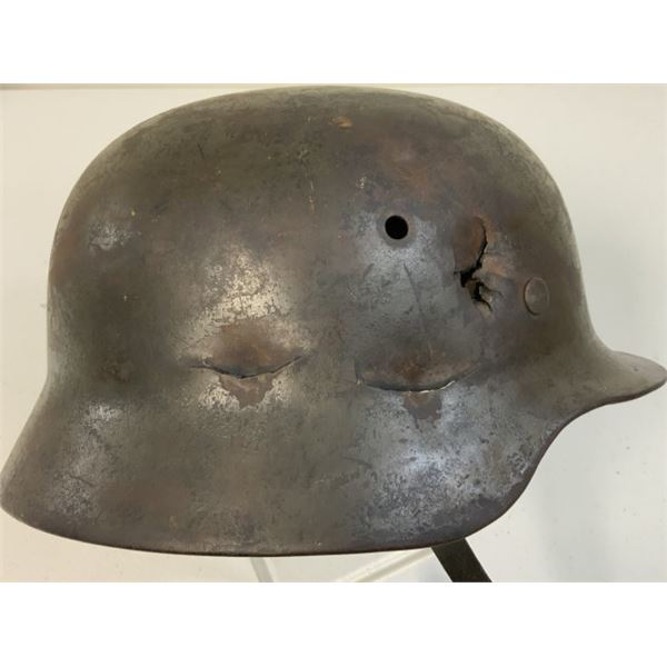 WWII GERMAN BATTLE DAMAGED M39 ARMY COMBAT HELMET WITH LINER AND CHIN STRAP