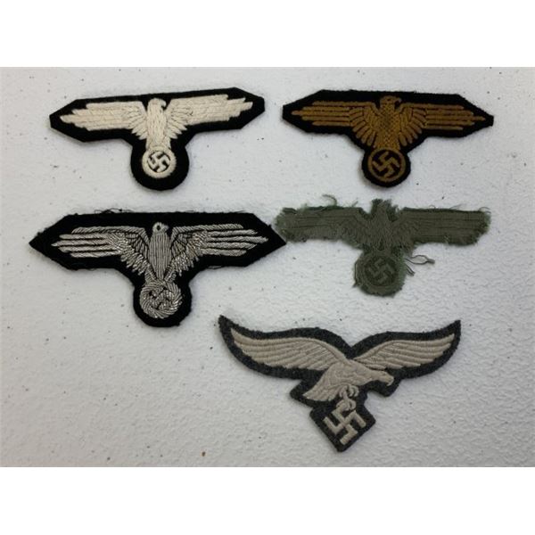 NAZI GERMANY THIRD REICH LOT OF INSIGNIA EAGLES SS , ARMY , LUFTWAFFE