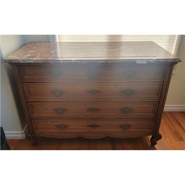 An Vintage Dresser With A Beautiful Marble Top
