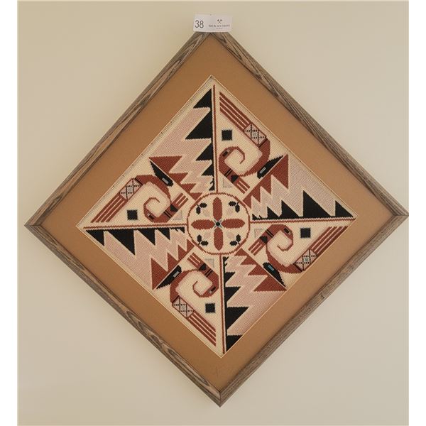 A Beautifully-Framed Cross Stitched Image