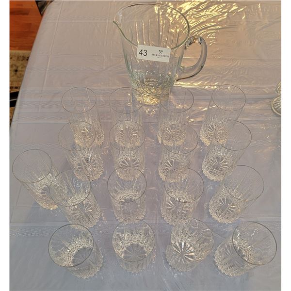 A Beautiful Crystal Water Pitcher, Accompanied By 17 Crystal Water Glasses.