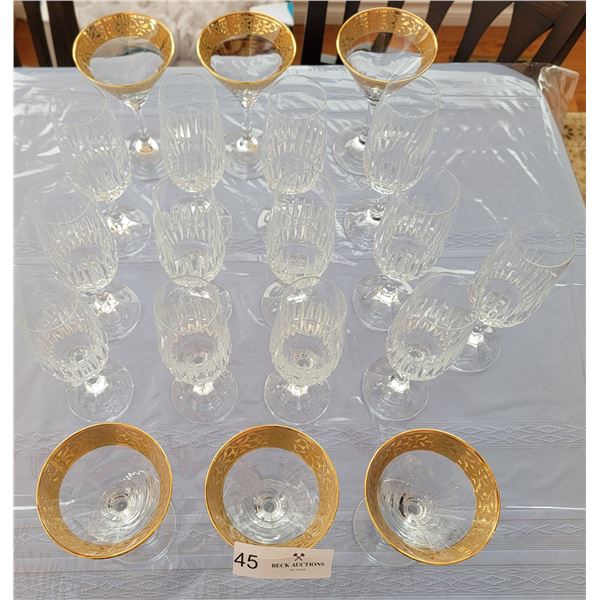 A Beautiful Collection of Crystal Champagne Glasses; Accompanied By 6 Gold-Rim Martini Glasses.