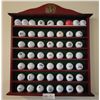 Image 1 : A Huge Assortment Of Collectible Golf Balls With A Gorgeous Wall Unit To Display Them In