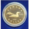 Image 1 : 1987 Proof Loonie Dollar. The first Loonie. Ultra Heavy Cameo. Housed in its original blue case & bo