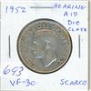 Image 1 : 1952 Silver 50 Cents with Hearing Aid in the king’s ear from a Die Clash. VF-30. Scarce.