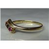 Image 1 : 10KT (F) gold ring with 3 stones (2 red, and 1 black/purple) - weight: 1.4 grams
