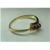 Image 4 : 10KT (F) gold ring with 3 stones (2 red, and 1 black/purple) - weight: 1.4 grams