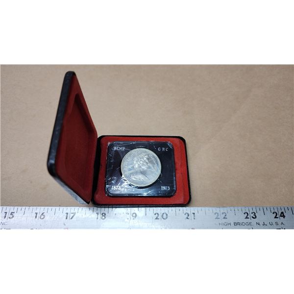 1873-1973 RCMP Canadian dollar - in clamshell case