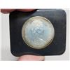 Image 3 : 1973 RCMP Centennial Silver Dollar. Housed in its original black clamshell case of issue. Specimen. 