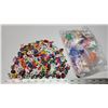 Image 1 : Bundle of mini erasers & bag of growing toy dinosaurs